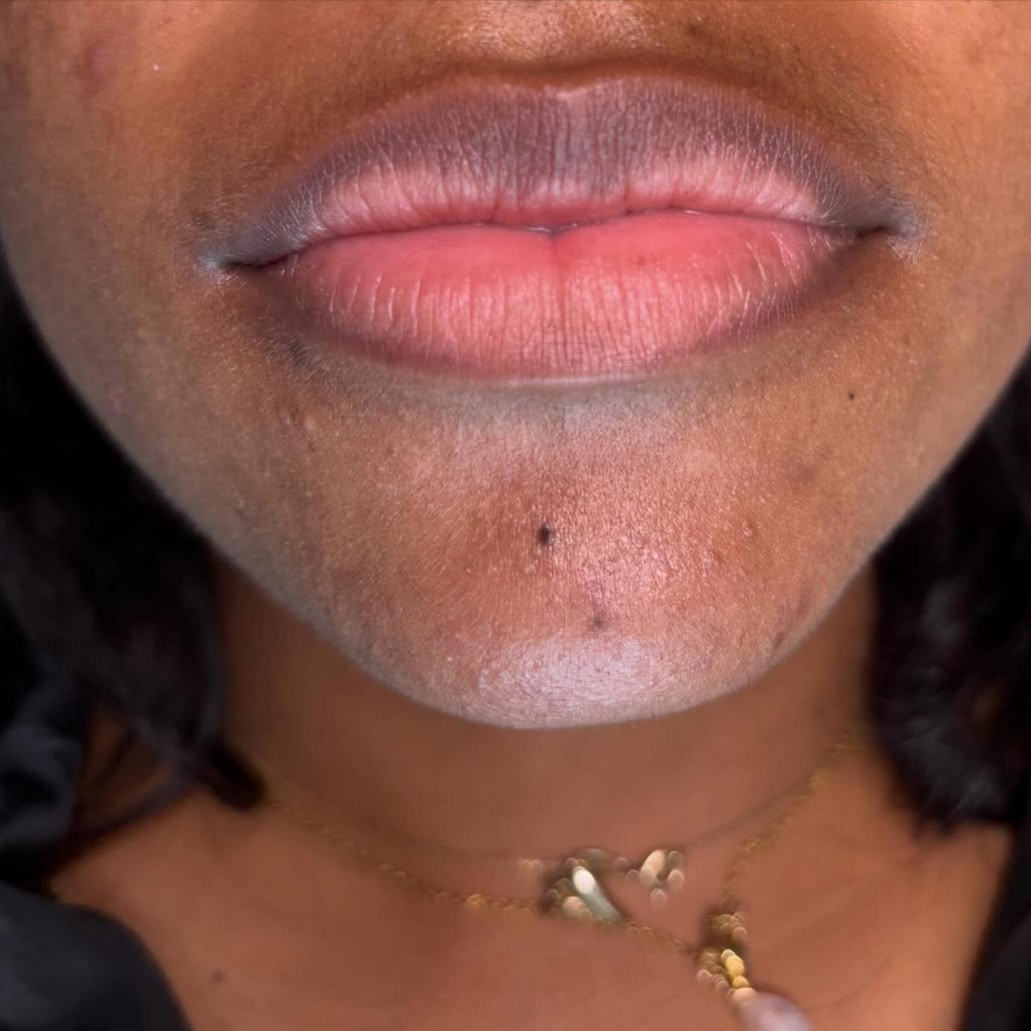 close up aquarelle lip tattoo details