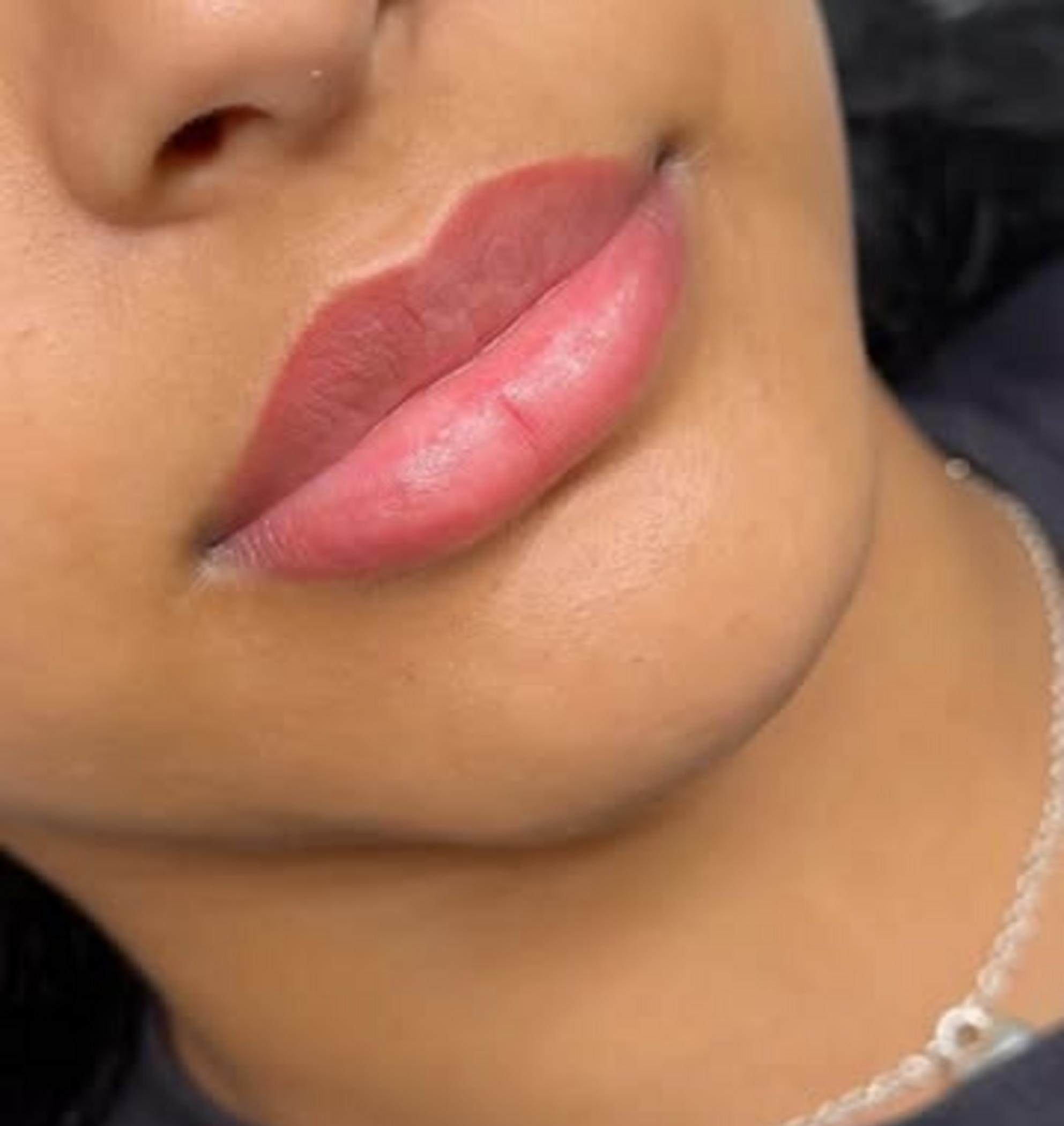 lip tattoo procedure in progress