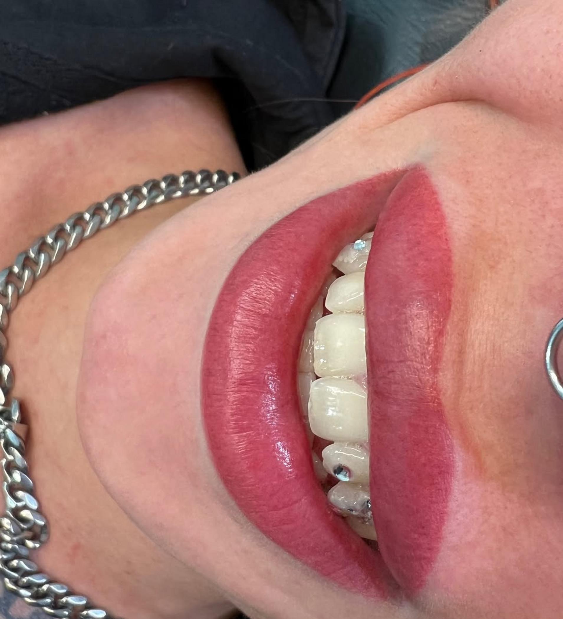 technician applying permanent lip color