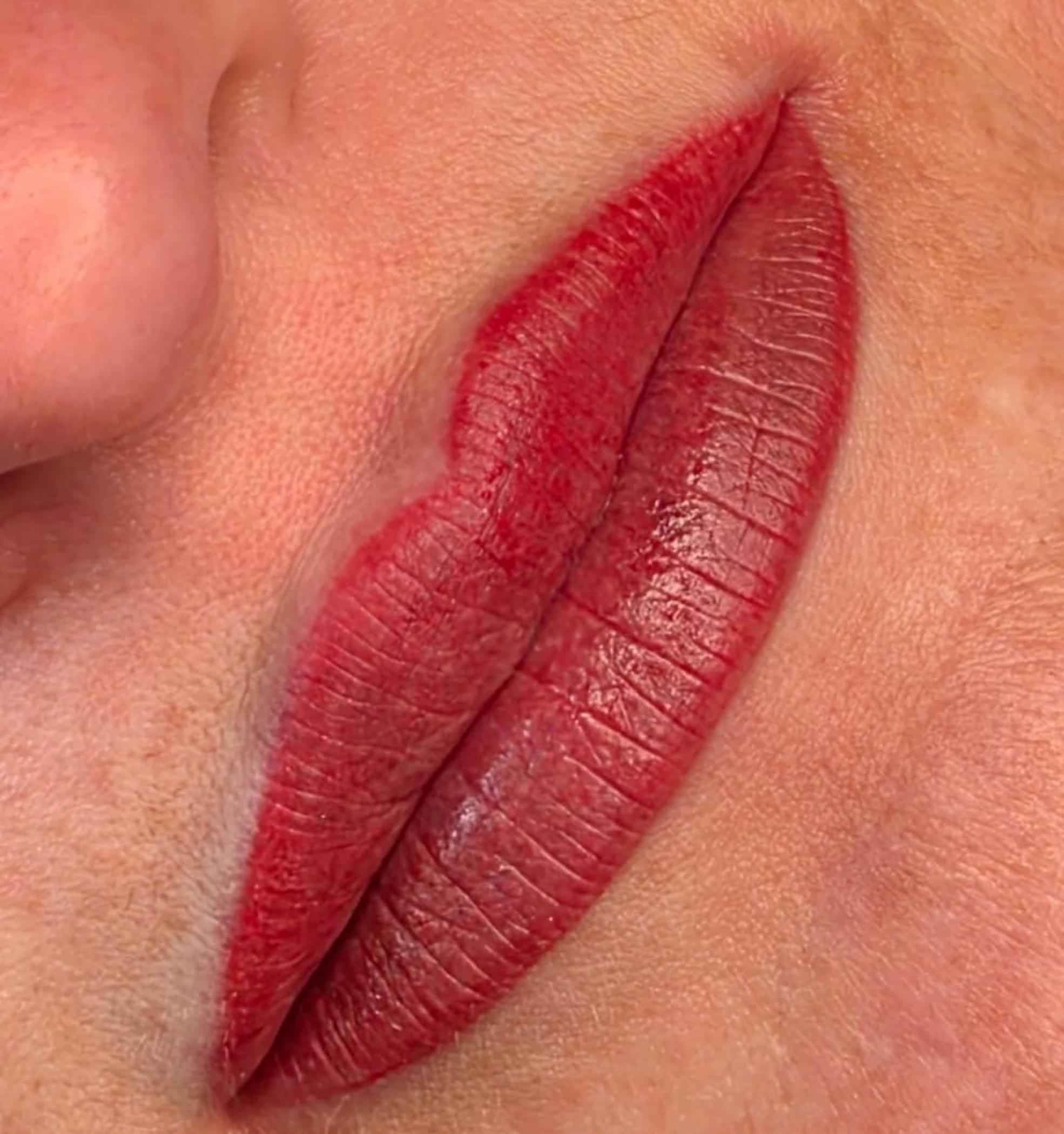 technician performing soft lip blush technique